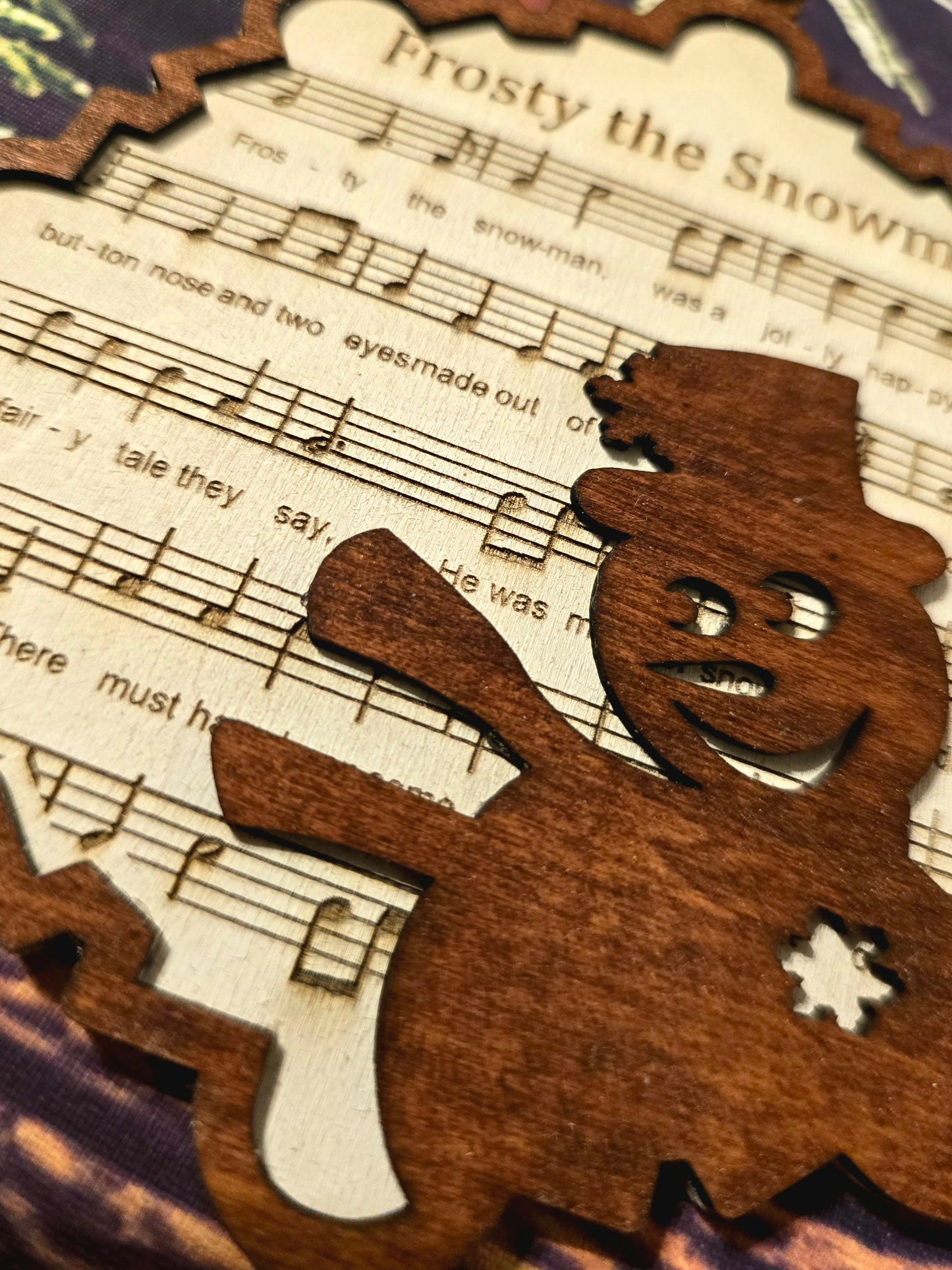 Frosty music sheet ornament